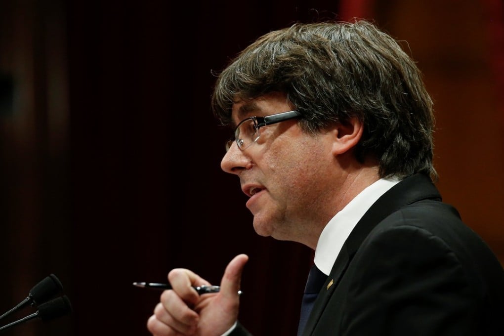 Catalan President Carles Puigdemont delivers a speech in the Catalonian regional parliament in Barcelona, Spain, October 10, 2017. Photo: Reuters