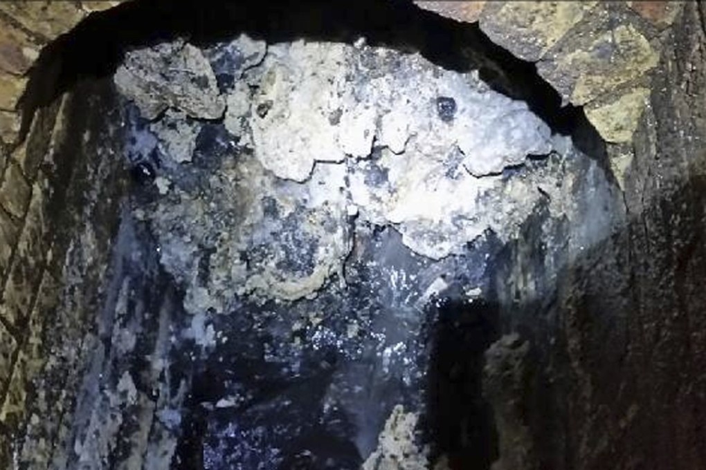 Part of a 250-metre-long, 130-tonne fatberg is seen in a sewer in Whitechapel, London, last month. Photo: AP