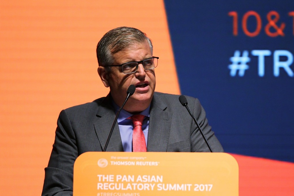 Tom Atkinson, executive director of enforcement at the Securities and Futures Commission, says the crackdown on fraud is important to maintain market confidence. Photo: Roy Issa