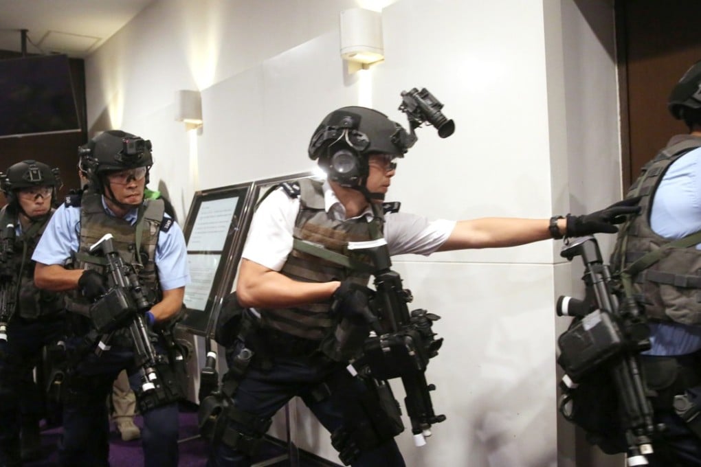 Elite anti-terrorist squad officers during a drill at City Hall in Central. Photo: Sam Tsang