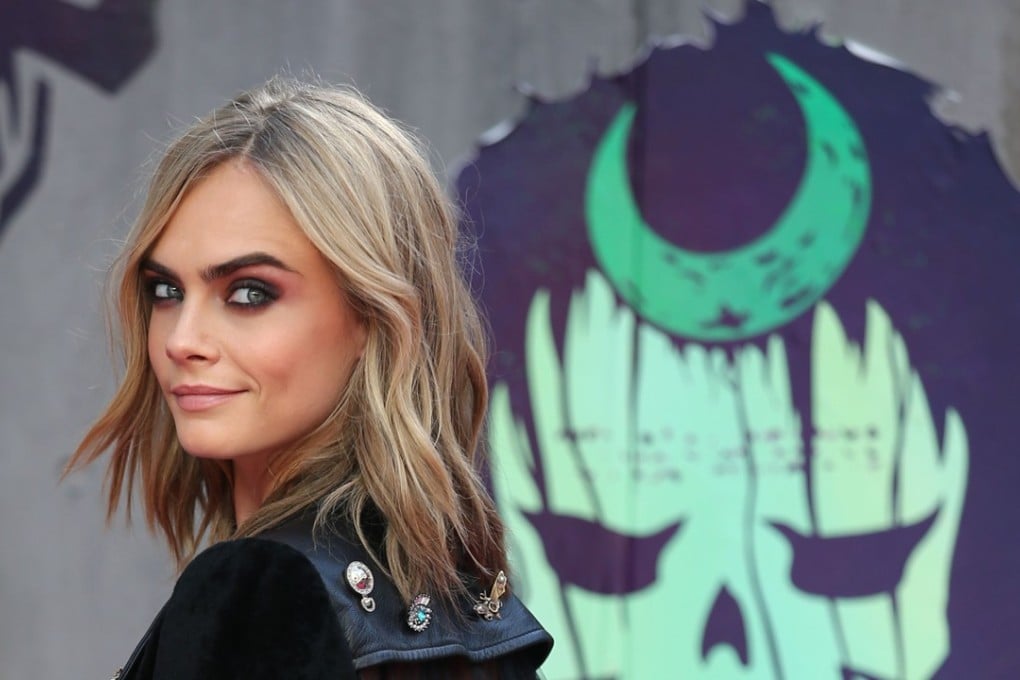 British model and actor Cara Delevingne, pictured in London last year at the European premiere of the film Suicide Squad, has accused disgraced Hollywood mogul Harvey Weinstein of propositioning her and attempting to kiss her after a meeting about an upcoming film. Photo: AFP