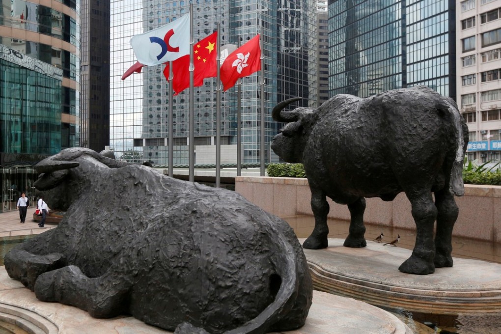 The Hang Seng Index finished the day at 28,459.03, up 0.24 per cent or 69 points. Photo: Reuters