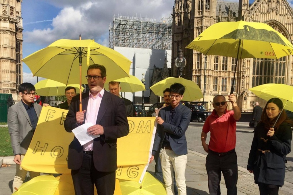 Benedict Rogers (centre) speaking at a demonstration for Hong Kong democracy outside Parliament House in London on September 28. Source: Twitter