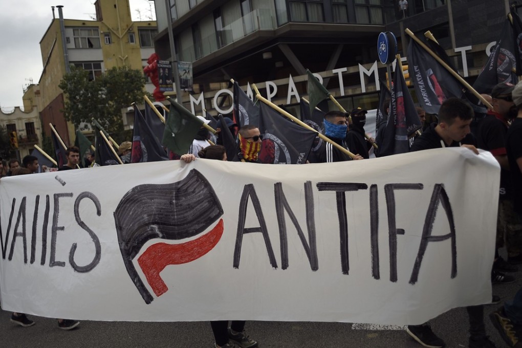 Protesters march during an anti-fascism demonstration in Barcelona on Thursday. China said it understands and supports the Spanish government’s efforts to protect the country’s unity and territorial integrity. Photo: AFP