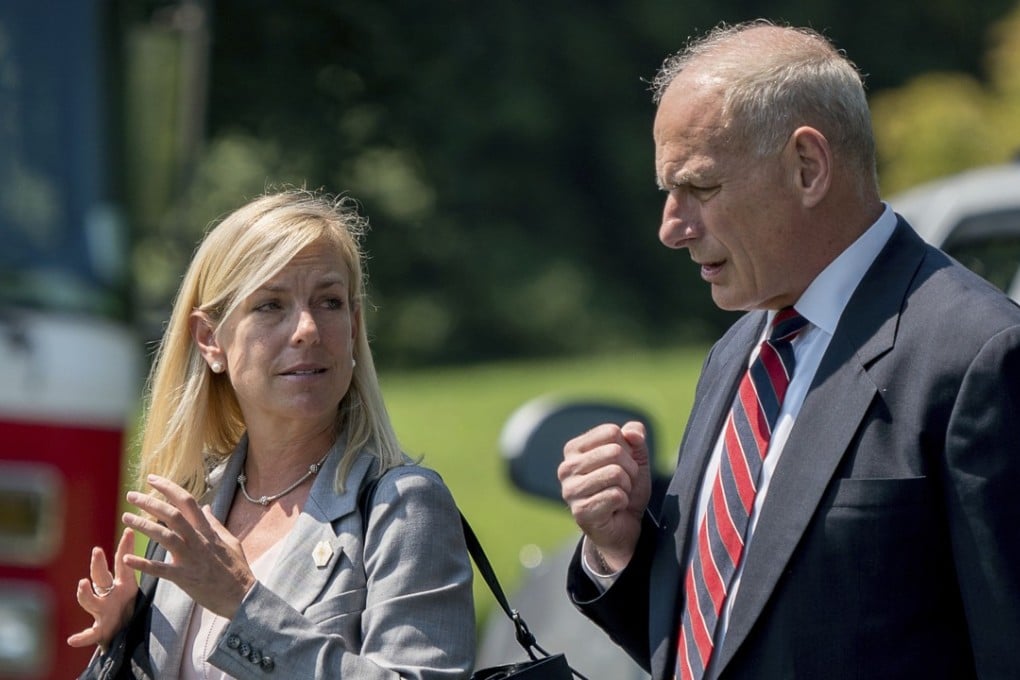 White House Deputy Chief of Staff Kirstjen Nielsen (left) with Chief of Staff John Kelly on the South Lawn of the White House. Photo: AP