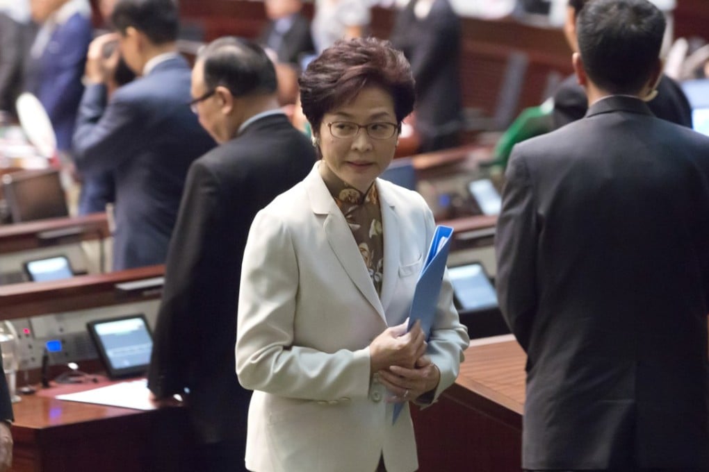 Hong Kong Chief Executive Carrie Lam leaves after delivering her policy address at the Legislative Council in Hong Kong, Wednesday, October 11, 2017. Photo: AP