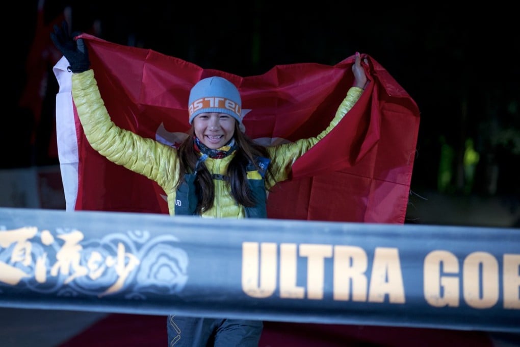 Hong Kong runner Samantha Chan crosses the finish line in third place in the Ultra Gobi race. Photo: Lloyd Belcher Visuals