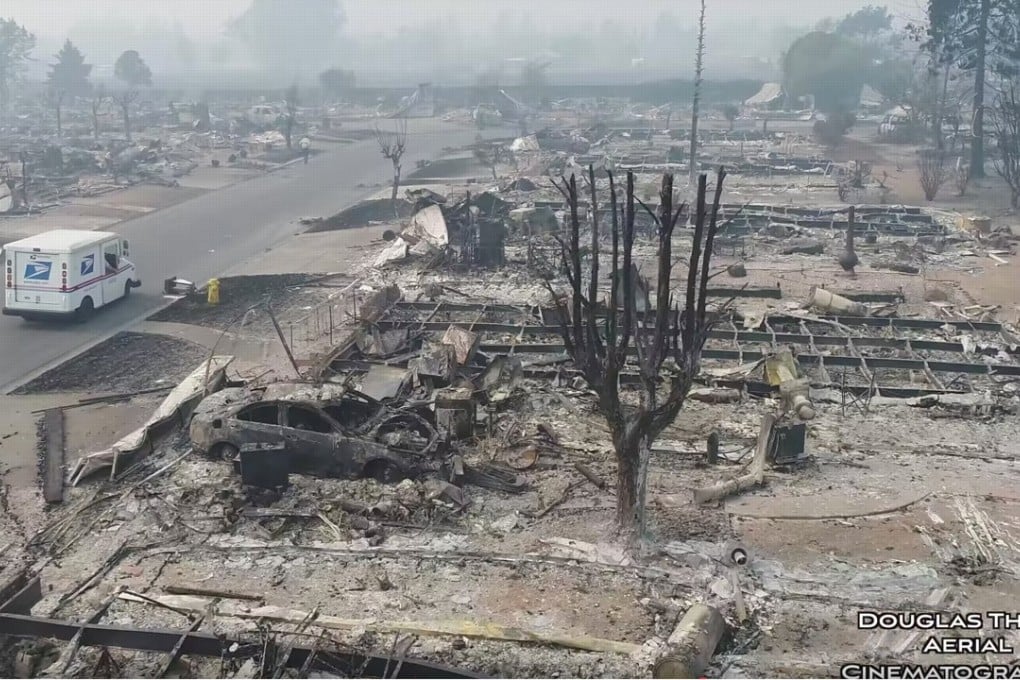 A postman delivers mail in fire-devastated Santa Rosa, California. Photo: Douglas Thron/Reuters/Naoto Yoshidome