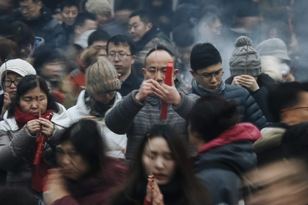Party members were warned not to take part in traditional Buddhist rituals. Photo: EPA