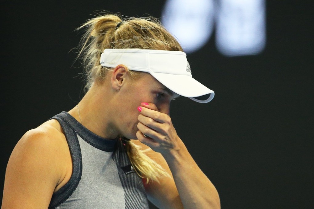 Caroline Wozniacki of Denmark was forced to withdraw from the Hong Kong Tennis Open moments before her match was set to begin. Photo: EPA