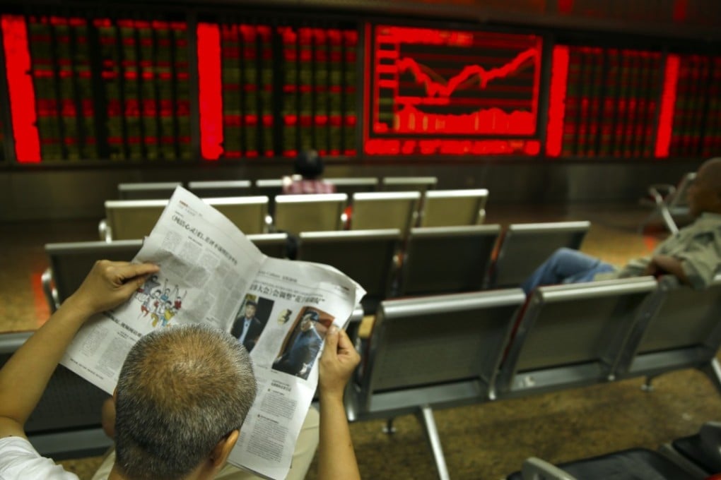 A Chinese investor at a brokerage house in Beijing. Photo: AP