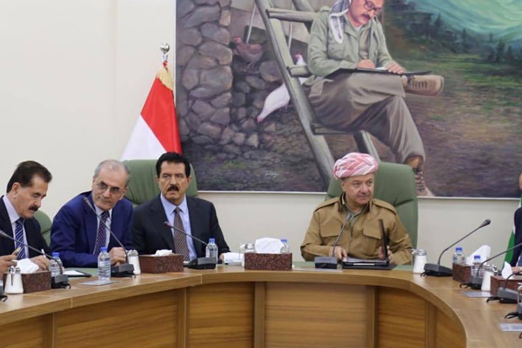 A picture taken on October 2, 2017 shows Kurdish regional president Massoud Barzani (C) meeting with Kirkuk provincial Governor Najim al-Din Karim (3-L) and Kurdish political parties representatives in Kirkuk. Iraq is demanding the Kurds recognise Iraqi unity after they voted for independence in a referendum last month. Photo: AFP