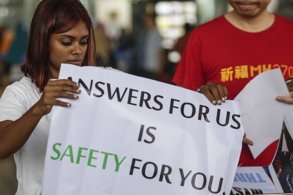 Relatives of the passengers aboard missing flight MH370 at Kuala Lumpur International Airport. Photo: EPA
