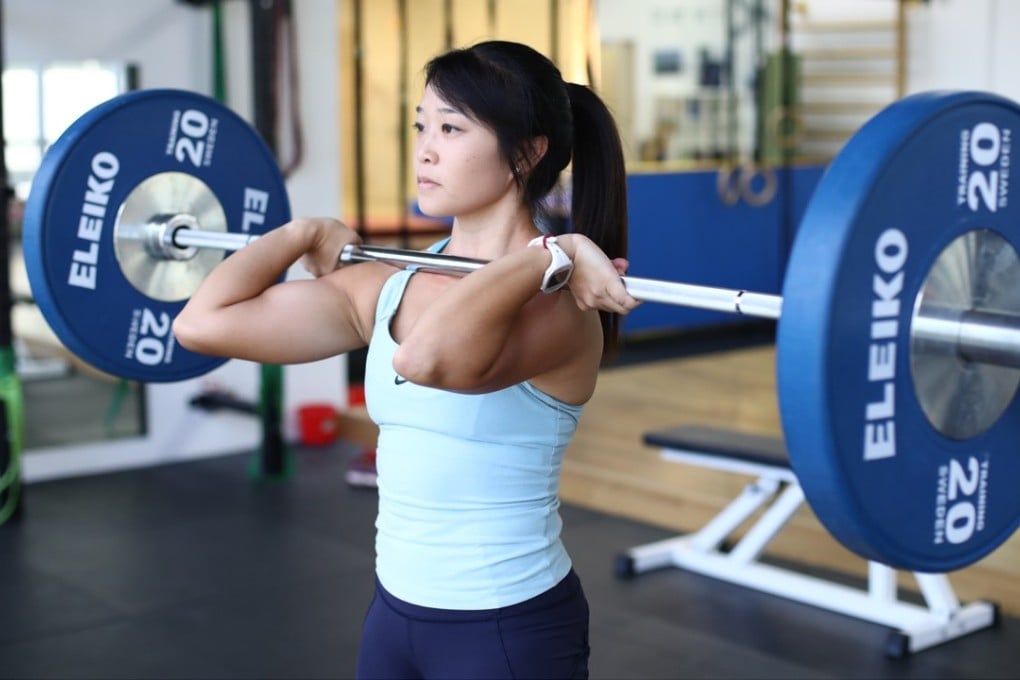 Weightlifter and founder of Trybe Studio, Kay Kay Keung, works out at Trybe Studio in Wong Chuk Hang. Photo: Nora Tam
