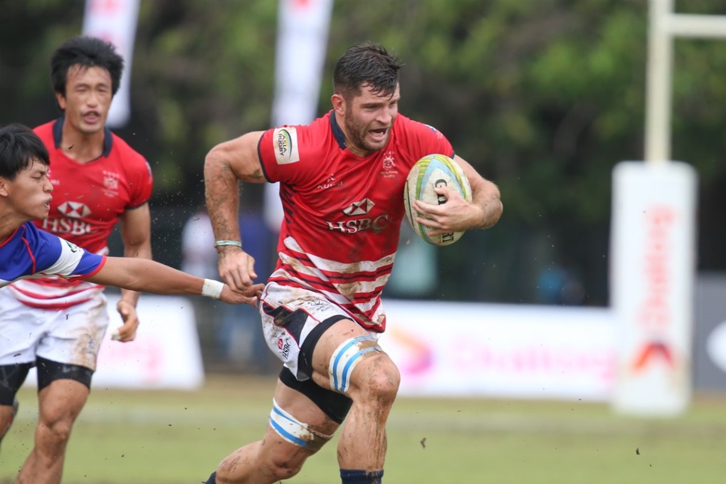 Hong Kong’s Kane Boucaut on his way to scoring four tries on day two of the Sri Lanka Sevens. Photos: HKRU