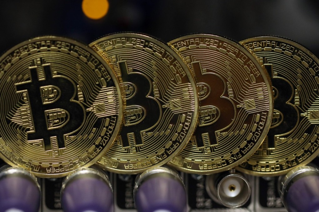 Despite their frothy valuations, cryptocurrencies are unlikely to become a mainstream means of exchange, according to UBS analysts. Photo: Bloomberg