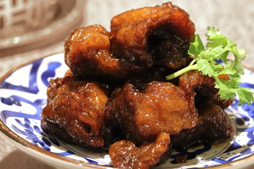 Smoked mandarin fish at the Regal Court at the Regal Kowloon Hotel .