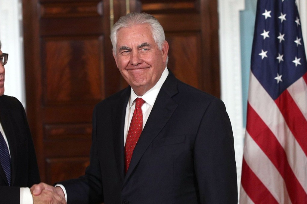 WASHINGTON, DC - OCTOBER 13: U.S. Secretary of State Rex Tillerson (R) shakes hands with Organization of American States Secretary General Luis Almagro (L) at the State Department October 13, 2017 in Washington, DC. Tillerson had a meeting with Almagro at the State Department today. Alex Wong/Getty Images/AFP == FOR NEWSPAPERS, INTERNET, TELCOS & TELEVISION USE ONLY ==