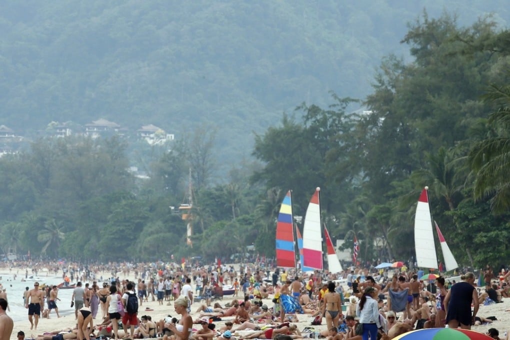 Foreign tourists sunbathe at Patong beach, Phuket island, southern Thailand. Thailand's Department of Marine and Coastal Resources (DMCR) has announced that smoking will be banned from November on 20 popular beaches in Thailand. Photo: EPA