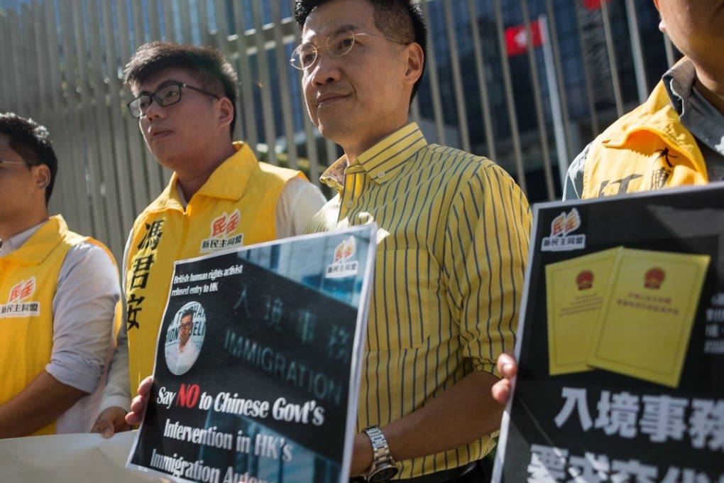 Pro-democracy activists believe Beijing is to blame for the decision to stop British Conservative Party activist Benedict Rogers entering Hong Kong. They held a protest on October 13 outside the government headquarters in Hong Kong. Photo: EPA-EFE