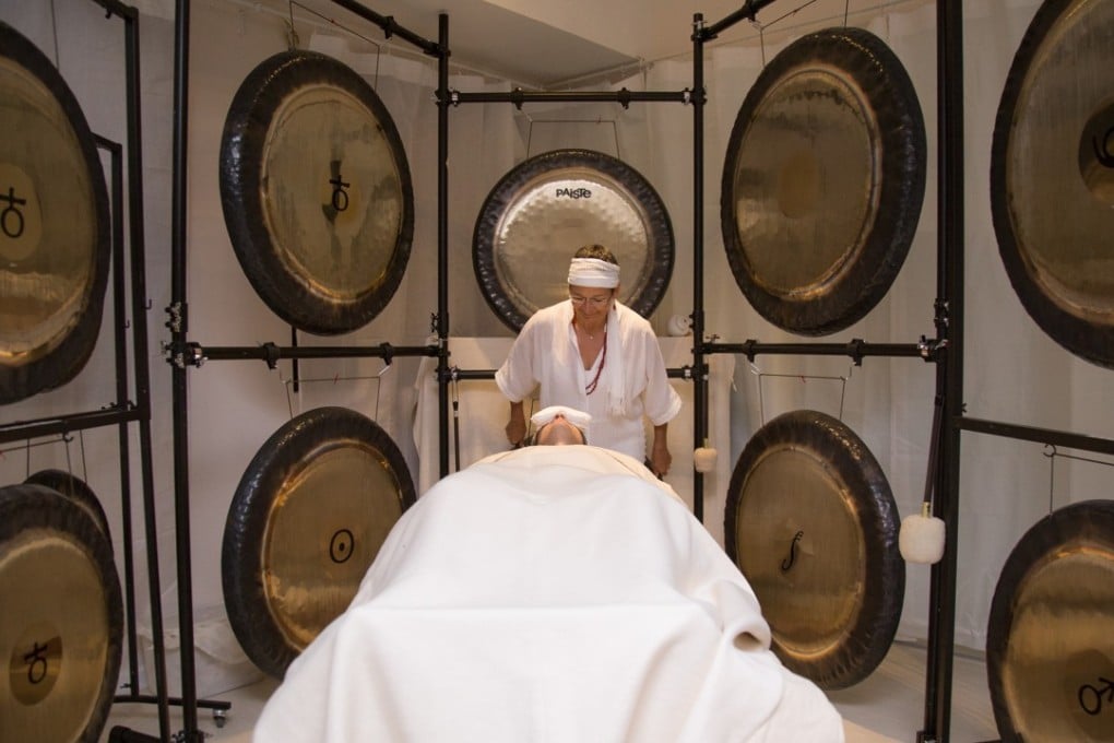 Martha Collard conducts gong baths at Red Doors Studio in Wong Chuk Hang, Hong Kong.