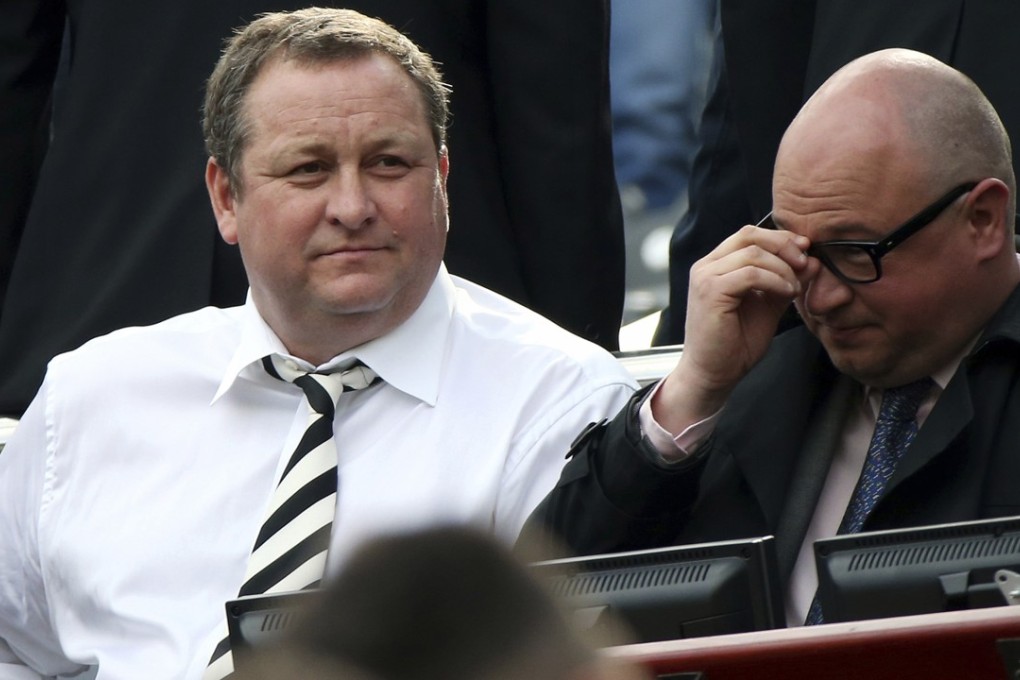 Newcastle United Mike Ashley (L) and managing director Lee Charnley. The English Premier League club has been put up for sale. Photo: AP
