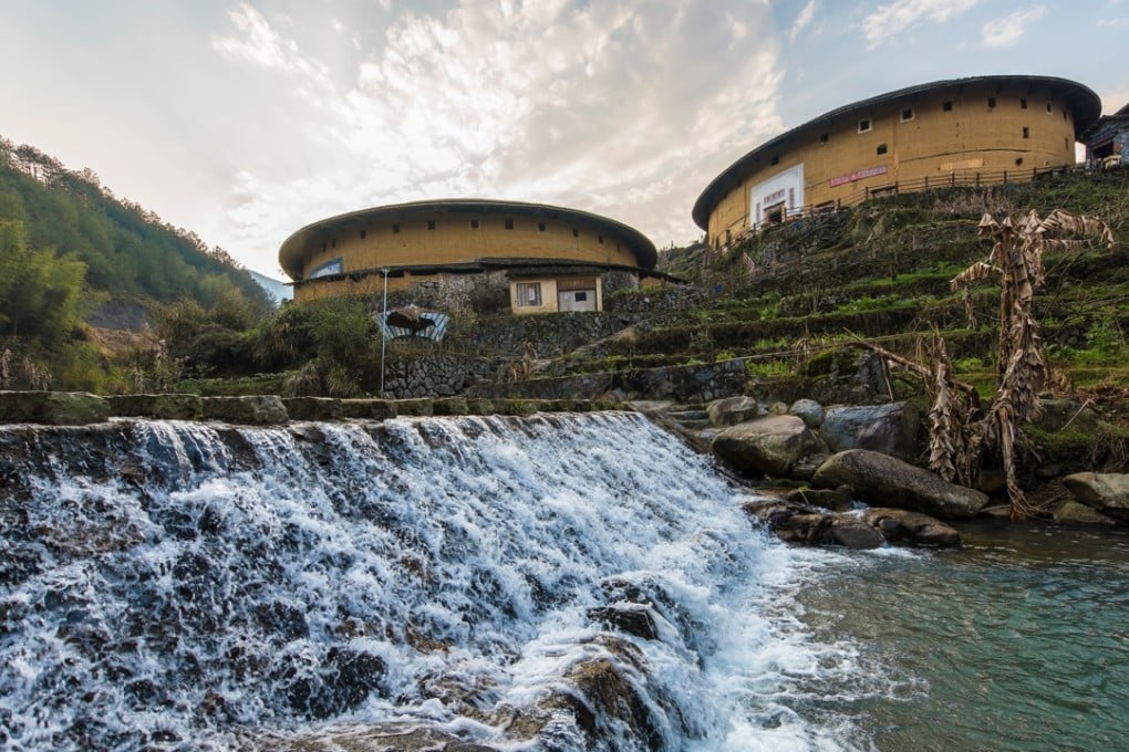 Tulou, or earthen buildings, in the Chuxi Tulou Cluster in Chuxi village, Yongding district, Fujian. The cluster consists of five round earthen buildings and 31 square earth buildings. Photo: AFP