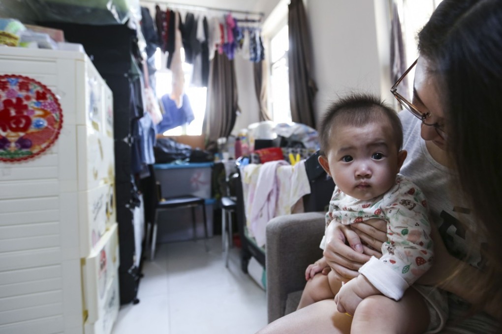 Yuen Yuk-ting and her baby daughter live with the rest of their family of five in a rented 270 sq ft flat in Chai Wan. Together, the family earns too much to qualify for government-subsidised housing, yet too little to afford a flat in the private market. The “starter homes” scheme is meant to help young, first-timer buyers in the so-called sandwich class. Photo: Xiaomei Chen