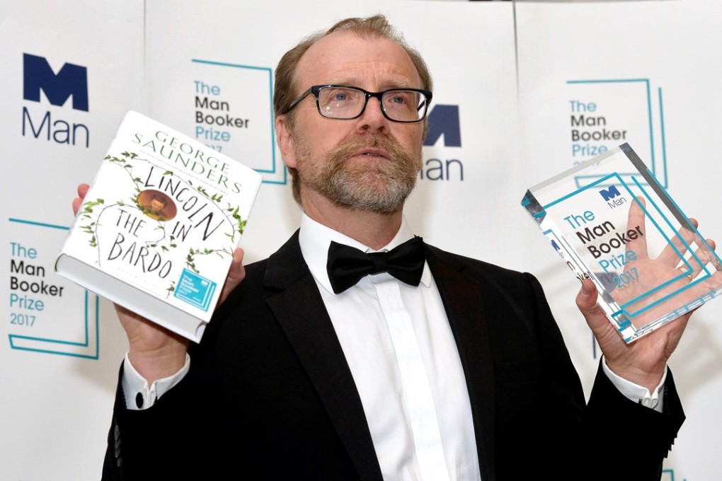 George Saunders, author of Lincoln in the Bardo, poses for photographers after winning the Man Booker Prize for Fiction 2017 in London on Tuesday. Photo: Reuters