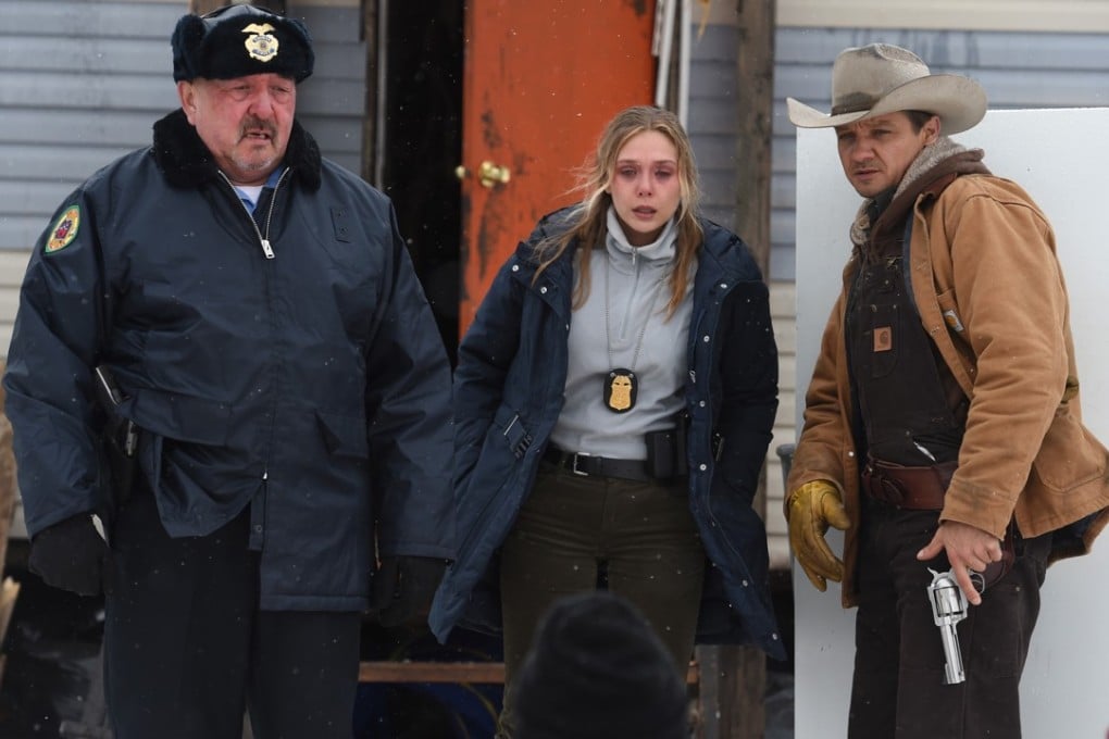 From left: Graham Greene, Elizabeth Olsen and Jeremy Renner in Wind River.