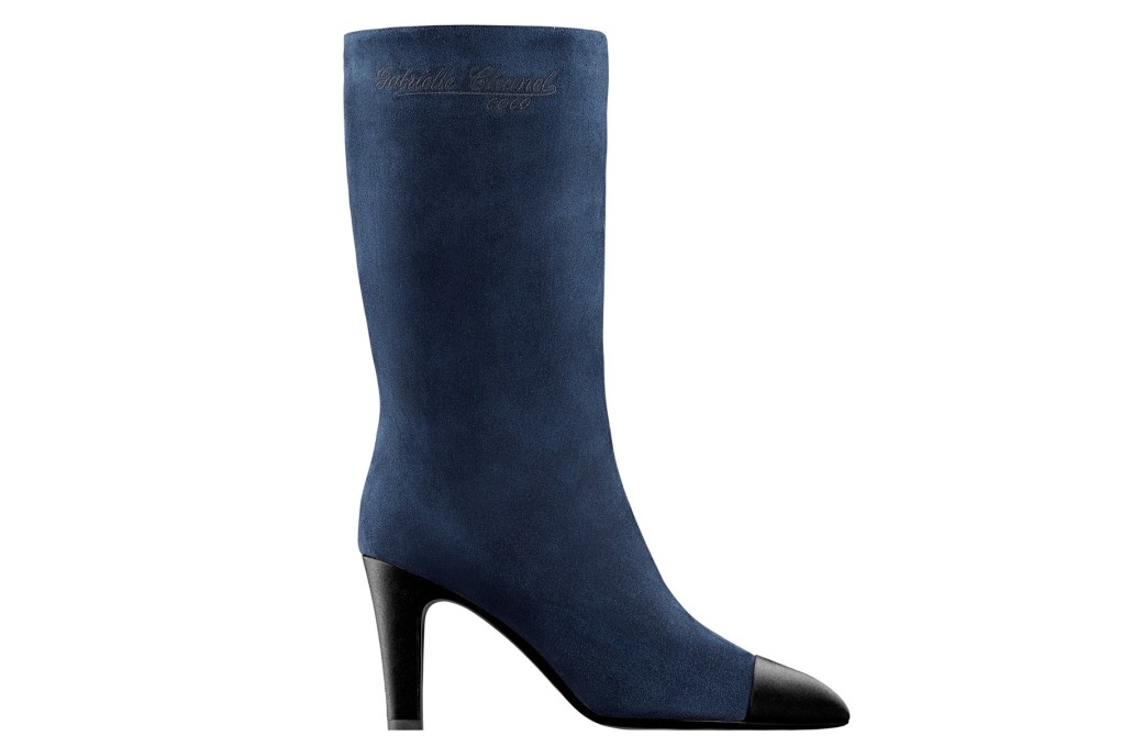Step out in Chanel’s navy suede boots and enjoy the envious glances that come your way