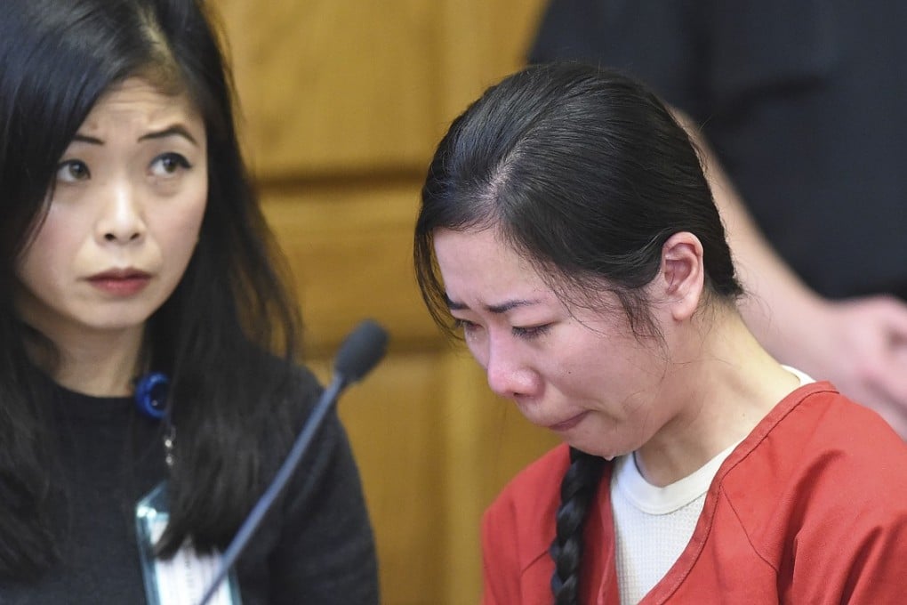 Mingming Chen, right, attends a hearing where her defence lawyer argued that a police interview in which Chen acknowledged killing her 5-year-old daughter should be excluded from the Chinese woman's murder trial because a translator wasn't present. Photo: The Canton Repository via AP