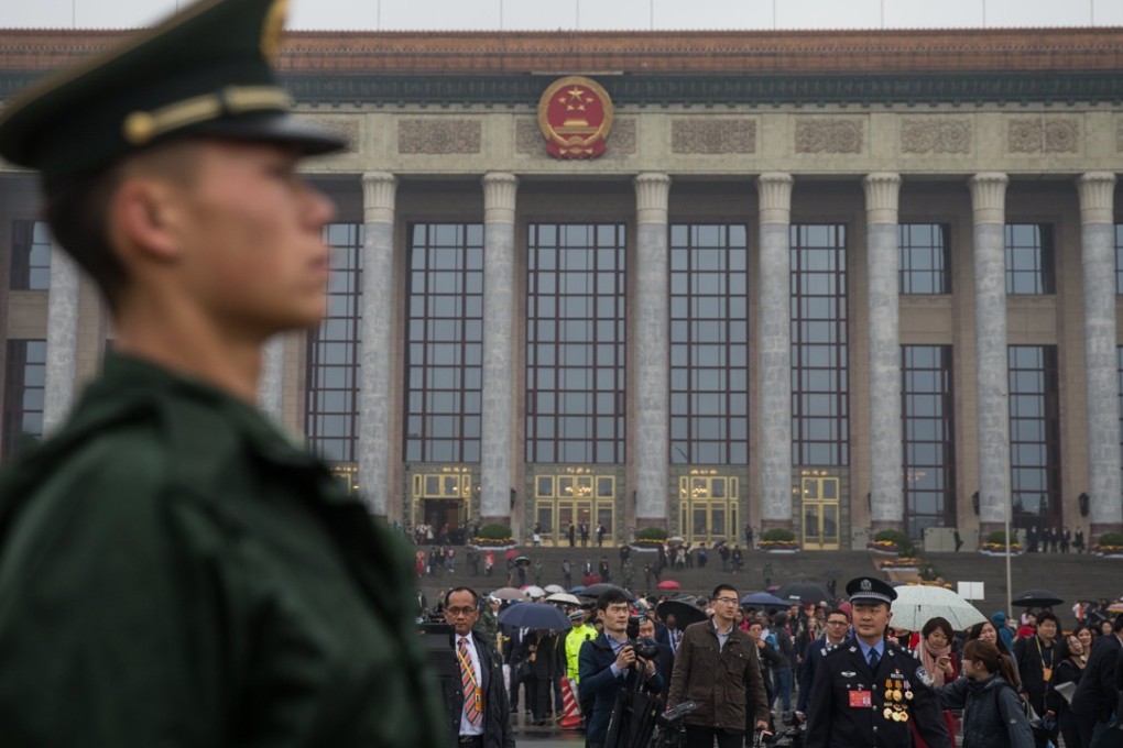 Delegates leave the Great Hall of the People in Beijing on Wednesday at the end of the opening session of the 19th National Congress of the Communist Party of China. Photo: EPA