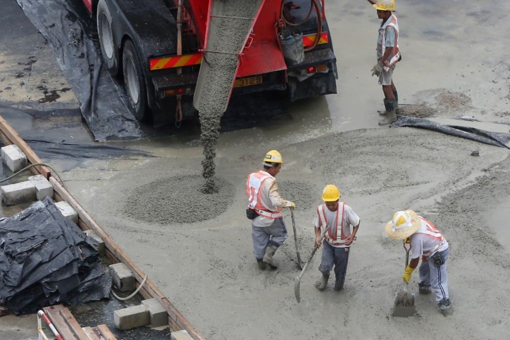 The city’s construction workers will benefit from an infrastructure and property boom. Photo: Felix Wong