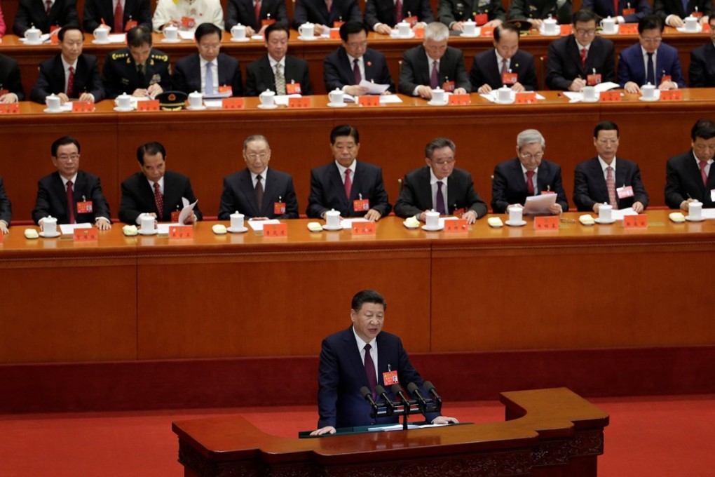 Xi delivers a keynote speech as the party’s general secretary and on behalf of the outgoing Central Committee.Photo: Reuters