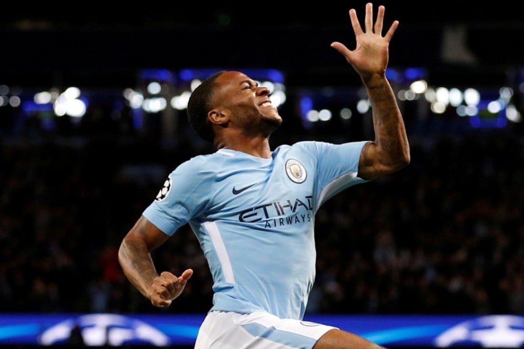 Raheem Sterling celebrates after opening the scoring. Photo: Reuters