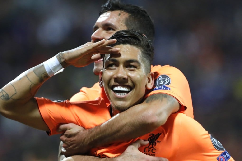 Roberto Firmino (front) bagged two goals. Photo: EPA
