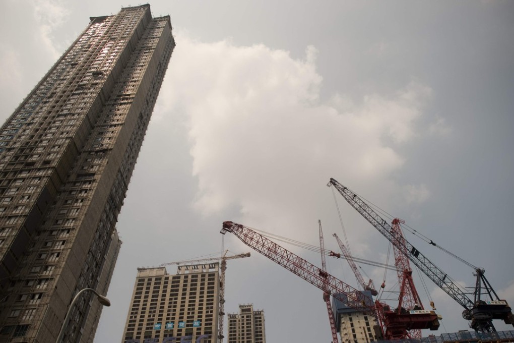 Chinese Estates cited ‘optimism’ about the overall prospects of Evergrande, which develops large-scale residential and commercial properties in the mainland. Photo: AFP