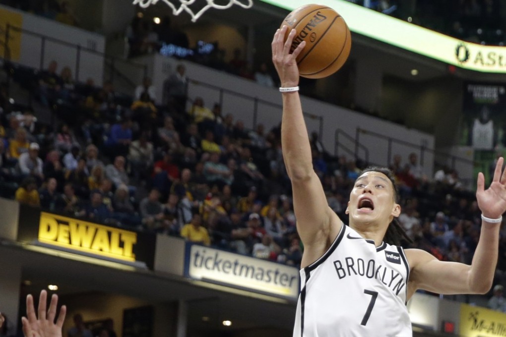 Brooklyn Nets guard Jeremy Lin shoots over Indiana Pacers forward Thaddeus Young. Photo: AP