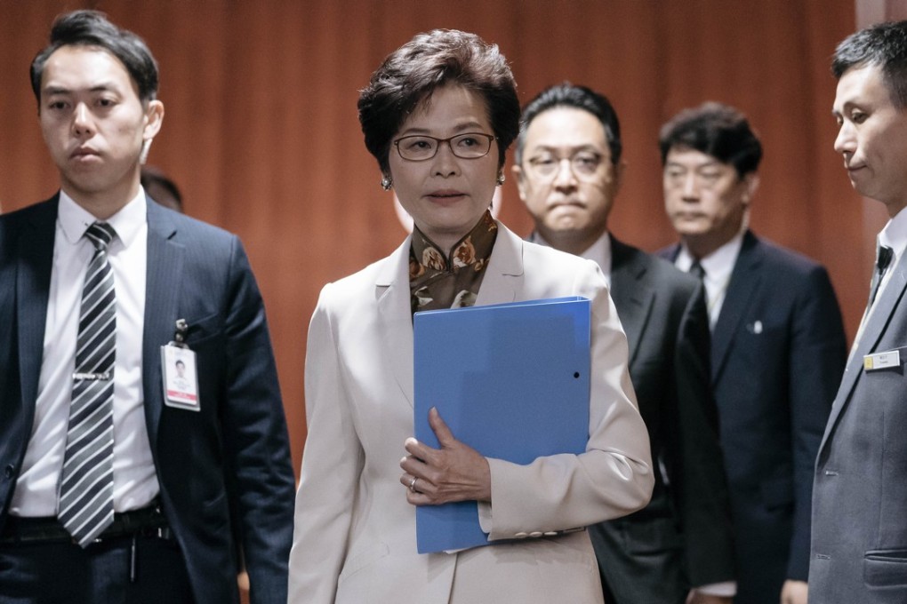 Hong Kong Chief Executive Carrie Lam leaves the Legislative Council chamber after delivering her policy address on October 11. Photo: Bloomberg