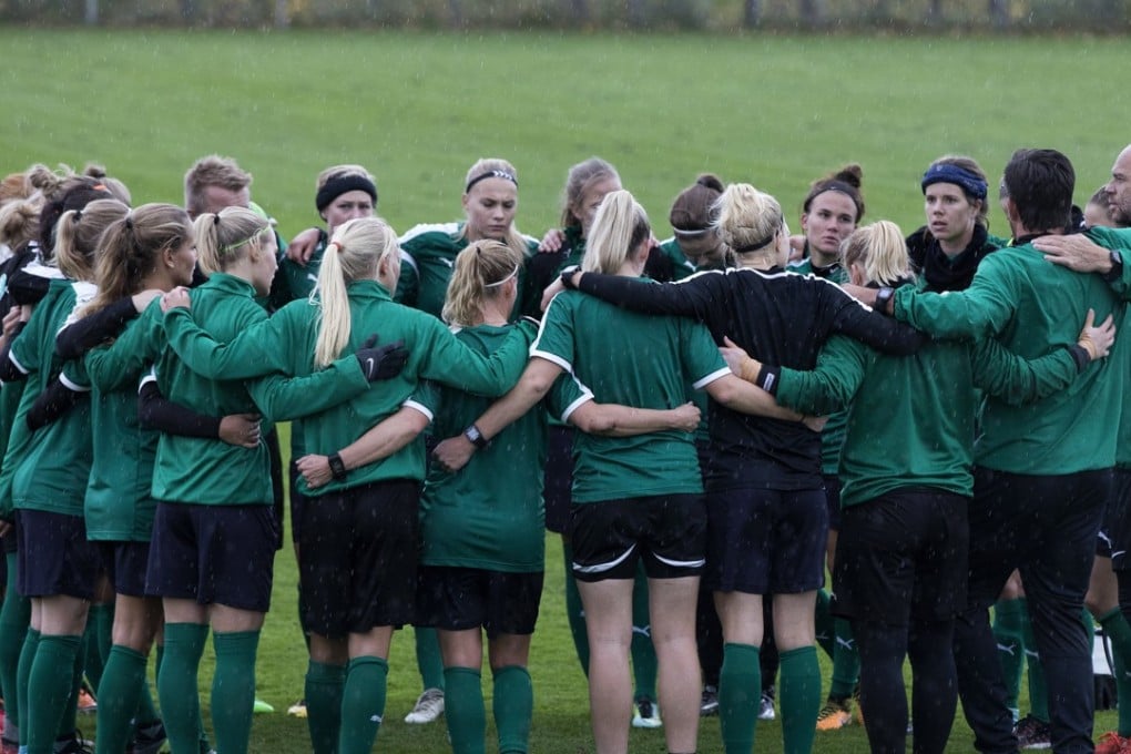 The Danish national team huddle together before training in Dragor, outside Copenhagen. A pay dispute involving the team forced the country's soccer federation to cancel the upcoming Friday World Cup qualifying match against Sweden. Photo: AP