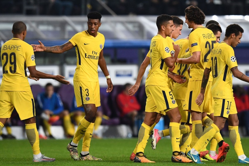 Paris Saint-Germain players celebrate at the end of the Champions League group B win over Anderlecht. Photo: AFP