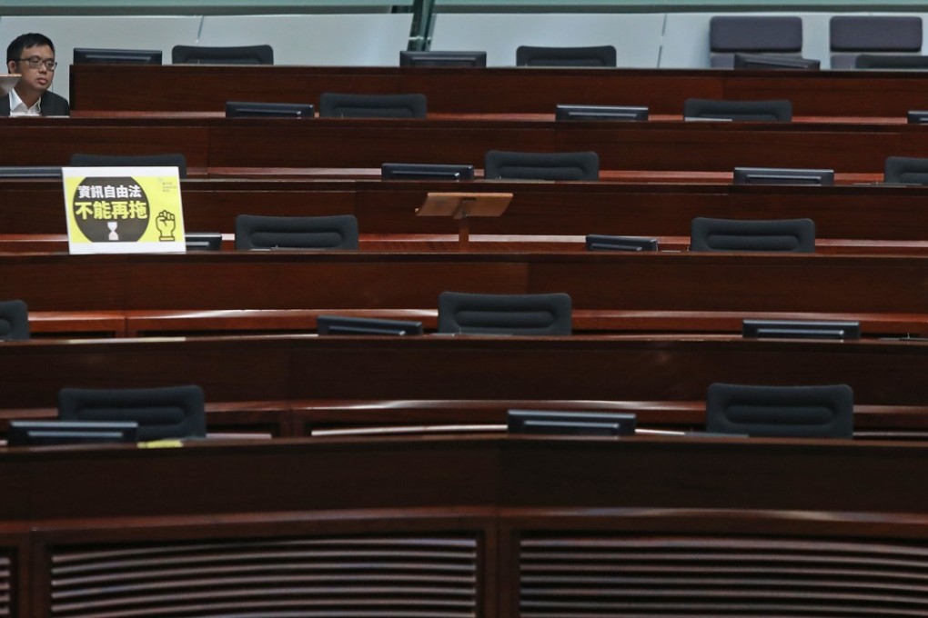 Pro-democracy lawmaker James To Kun-sun alone in the Legco chamber on Wednesday. Photo: Sam Tsang