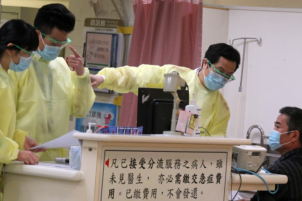 Doctors and a patient at Queen Elizabeth Hospital. Photo: Handout