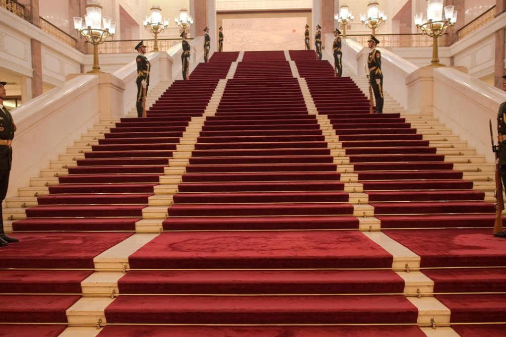 Military guards inside the Great Hall of the People in Beijing, where President Xi Jinping is expected to be given a second five-year term as the powerful general secretary of the Communist Party, at its 19th congress due this month. Photo: AFP