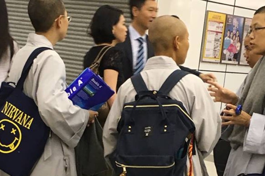 Hong Kong teacher Gaz Flint's photo of monks with Nirvana bags, taken in Tai Po, that went viral on social media. Photo: Gaz Flint