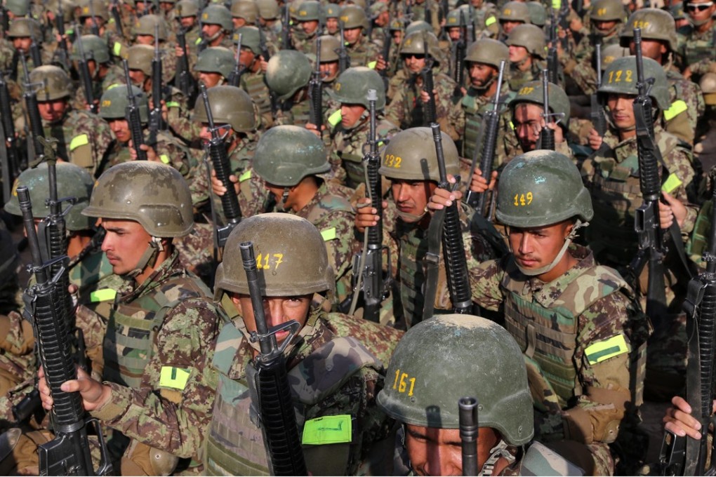 Afghan army soldiers take part in a military training in western Afghanistan. At least 152 Afghans sent to the United States for military training during the course of the war against the Taliban have gone AWOL, according to a report by the Special Inspector General for Afghanistan Reconstruction. Photo: TNS