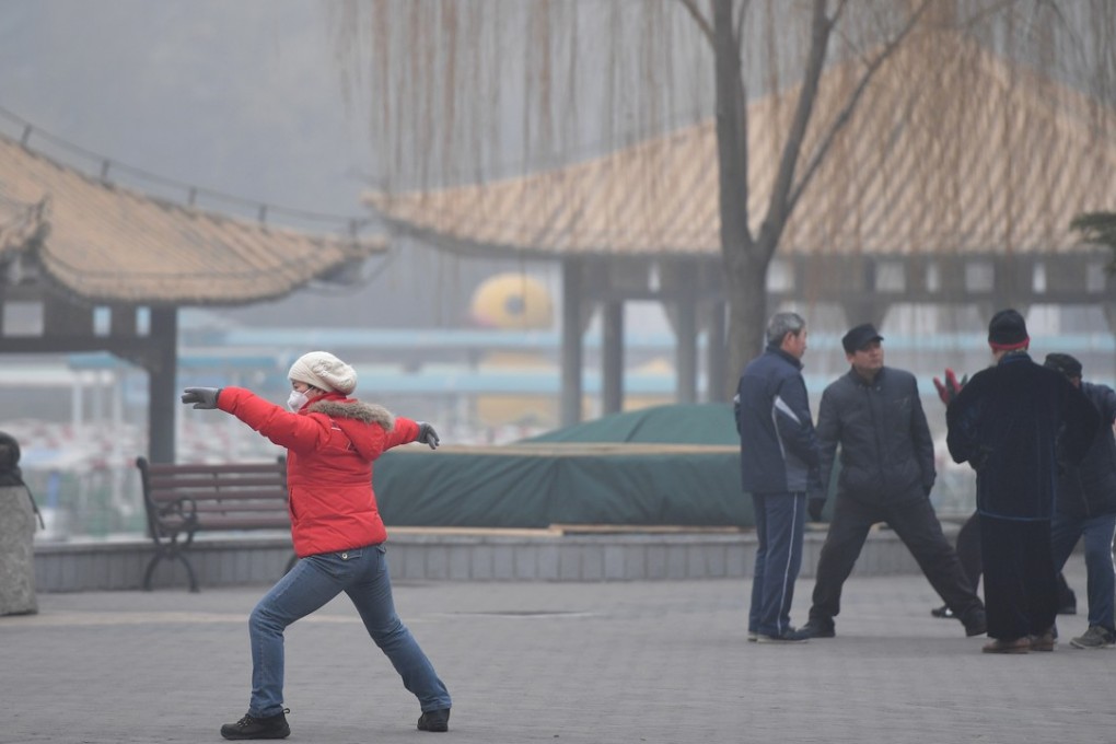 A citizen does morning exercises at the Taoranting Park in Beijing. Photo: Xinhua/Li Xin