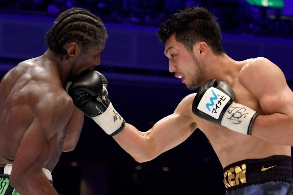 Japan’s Ryota Murata connects with a right uppercut against Hassan N’Dam. Photo: AFP