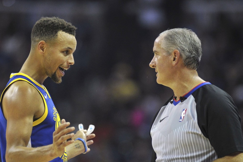 Golden State Warriors guard Stephen Curry talks with referee Scott Wall during the first half against the Memphis Grizzlies. Photo: USA TODAY Sports
